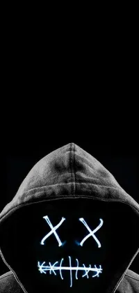 This phone live wallpaper showcases a futuristic image of a mysterious figure donning a black hoodie and neon mask, illuminated by blue neon lighting