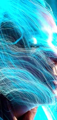 This phone live wallpaper showcases a vibrant, blue-haired character with electrified locks amid stunning digital art