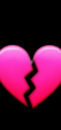 This phone live wallpaper features a broken pink heart on a black background, depicting the pain of heartbreak