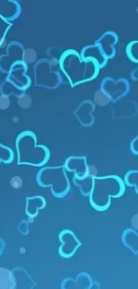 This exquisite phone live wallpaper showcases a mesmerizing blue background with scattered blue hearts, depicting a calm and soothing atmosphere