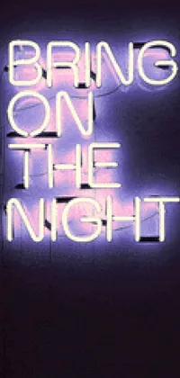 Looking for a cool and trendy live wallpaper for your phone screen? Check out this "Bring on the Night" neon sign design! The bold pink letters of the sign contrast beautifully against the deep blue background, lending a retro touch to your phone's overall look