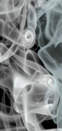 The smoking live wallpaper features a close-up of translucent smoke on a sleek black background that creates an ultrafine detailed effect