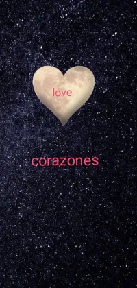This phone live wallpaper features a heart with the words "love corazonees," an abstract album cover, a full moon with stars, a horizon line, and the word "fotografia
