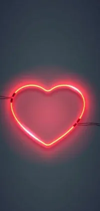 Looking for a phone live wallpaper that's unique and eye-catching? Check out this stunning neon heart design! With vibrant colors and exciting shapes, this wallpaper is perfect for anyone who loves a bold, modern look