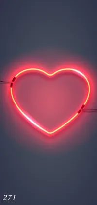 This live wallpaper features a neon heart sign in vintage style with bright colors