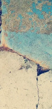 Transform your phone screen with a unique live wallpaper featuring a bold and vibrant yellow fire hydrant against a backdrop of abstract turquoise rust and swirling cracks
