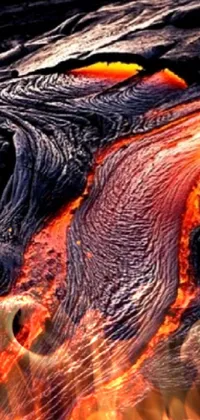 This phone live wallpaper showcases a captivating close-up of a lava flow in water