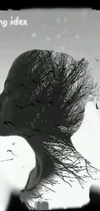 This stunning phone live wallpaper features an artfully captured black and white image of a woman with her hair blowing in the wind