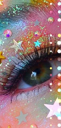 This live wallpaper features close-up glitter eyes in a playful digital art style with stars in the background