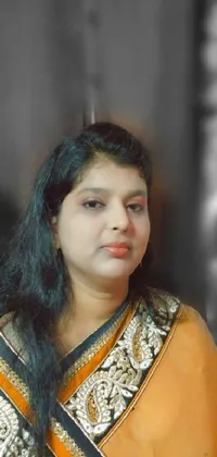 This live wallpaper features a professional black and white photo of a woman wearing a traditional sari