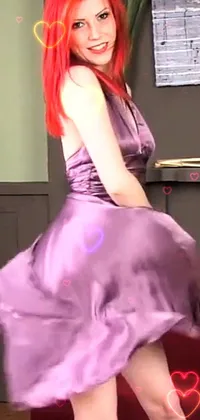 This live phone wallpaper features a fiery-haired woman wearing a vibrant purple dress
