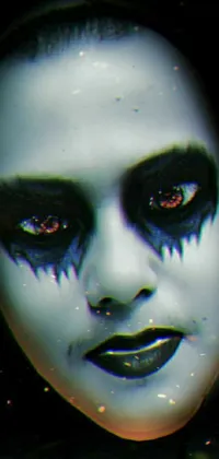 This live wallpaper features intense black eyes, striking makeup, and ethereal looks, giving it an eerie and surreal quality