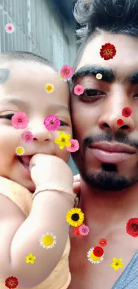 This live wallpaper depicts a man holding a baby in arms