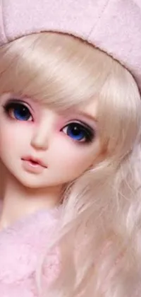 This live wallpaper showcases a close-up of a doll adorned with a stylish hat and enchanted eyes