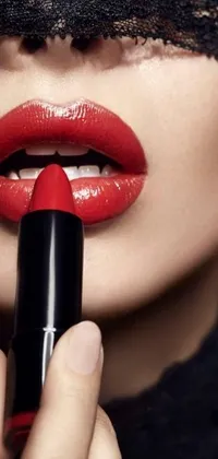 This phone live wallpaper depicts a woman applying a bold red lipstick in ultra-realistic style