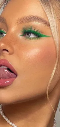This stunning phone live wallpaper showcases a close-up of a woman's face with captivating green eyes, emphasized by neon green lighting