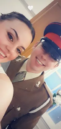 This live wallpaper depicts a heart-warming moment showing a man and woman in uniform posing for a photograph