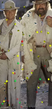 This phone live wallpaper features two men dressed in white Russian clothes, standing side by side while using a computer