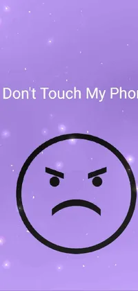 This phone live wallpaper features an eye-catching design in purple, with a sad face at the center and the message "don't touch my phone" in bold letters