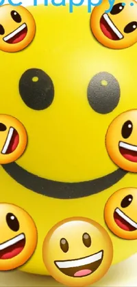 This dynamic phone live wallpaper features a playful yellow ball carrying a variety of emoticons that express different expressions