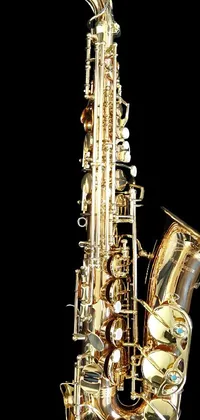 This live phone wallpaper features a close-up of a brass saxophone, with high detail and contrast against a black background