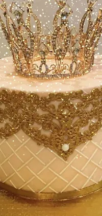 This luxurious live wallpaper features a white and gold baroque cake artfully adorned with crystal details and a sparkling crown on top