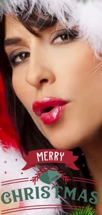 This phone live wallpaper features a beautiful vector art image of a woman wearing a Santa hat, perfect for the holiday season