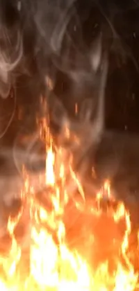 This stunning phone live wallpaper features realistic flames with smoke effects and mesmerizing Houdini particles