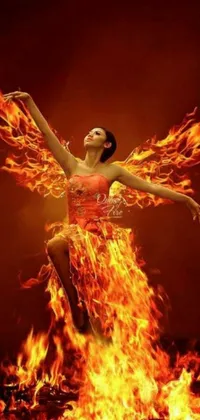 Looking for a stunning phone live wallpaper to liven up your device's screen? Look no further than this highly realistic digital art of a woman in a fiery dress flying through the air! Created by Ju Lian and available through pixabay, this beautiful and captivating wallpaper showcases the woman in vivid detail, soaring against a cosmic night sky background
