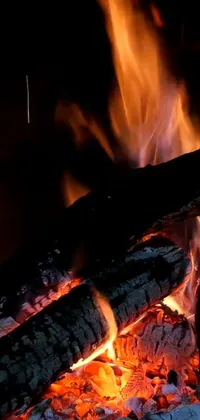 Bring the warmth of a burning fire onto your phone with this mesmerizing live wallpaper