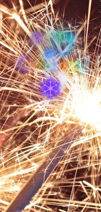 This stunning phone live wallpaper showcases a high-resolution close-up of a sparkling sparkler contrasted against an elegant black background