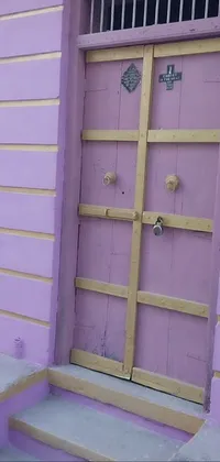 This stunning phone live wallpaper showcases a close-up view of a door on a building