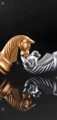 This chess-themed live wallpaper features a macro photograph of two elegantly-designed pieces - a king and queen - craftily placed side-by-side