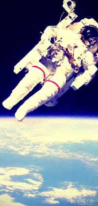 Experience the awe-inspiring view of an astronaut floating above the earth with this phone live wallpaper
