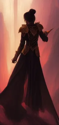 This phone live wallpaper features a man on top of a mountain dressed in dark robes with gold accents, holding a sword