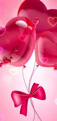 This stunning live wallpaper features three heart-shaped balloons with red ribbons and bows on a pink background