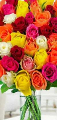 This phone live wallpaper features a beautiful vase filled with colorful roses of different sizes and shades