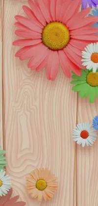 This phone live wallpaper features a stunning close-up of colorful flowers on a rustic wooden surface