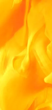 This live wallpaper features a vibrant yellow rose in a vase, set against a digital art background that is inspired by abstract paintings and features flowing fabric elements