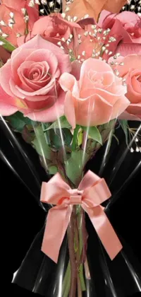 This live wallpaper for your phone showcases a lovely bouquet of pink roses with baby's breath