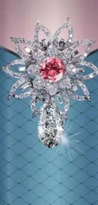 This live wallpaper showcases a stunning pink diamond brooch on a rich blue background