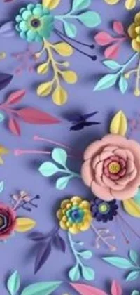 This phone live wallpaper features a digital art collage of paper flowers and leaves on a purple background