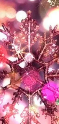 This delightful phone live wallpaper showcases a digital rendering of a snowflake captured in close-up, with twinkling lights shimmering in the background