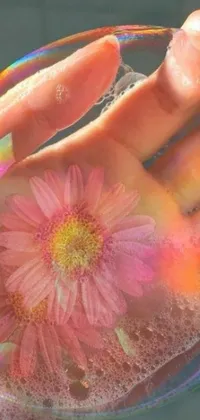 This mesmerizing phone live wallpaper showcases a bubble with a flower inside, utilizing transparent glowing skin and dreamlike floating elements