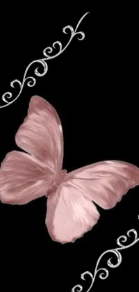 This phone live wallpaper features a beautiful pink butterfly perched on a leaf, delicately spreading its wings in shades of pink and purple