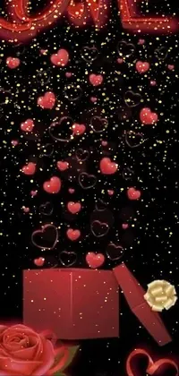This live wallpaper features a digital artwork depicting a heart-themed box against a galaxy-like black background adorned with stars