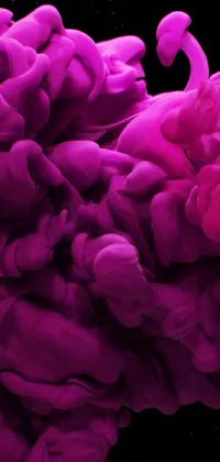 This phone live wallpaper showcases a captivating visual of liquid pink shapes floating against a dark black background