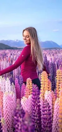 This stunning live wallpaper features a woman surrounded by blooming hyacinths in a beautiful field of purple flowers