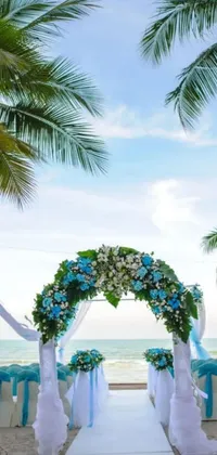 Get swept away in the romance of a beach wedding with this mesmerizing live wallpaper
