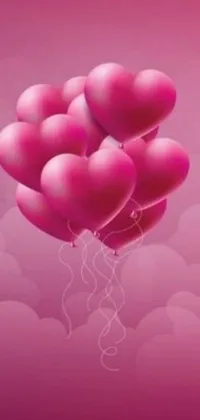 This live wallpaper features a delightful composition of pink balloons floating freely in the air